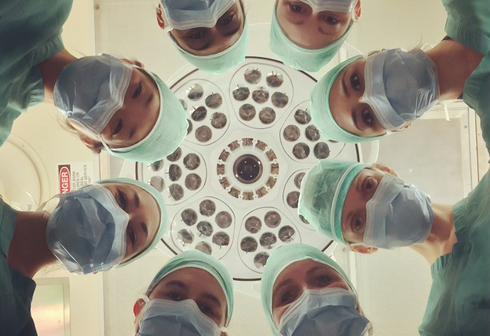 Orthopedic specialist examining patient